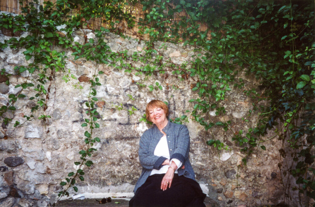 Elaine Badgley Arnoux sitting on the "crying bench" in Biot, France.